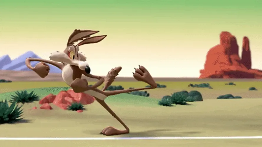 wile-e-coyote-running-into-fake-tunnel-v206evzaeobehq3r